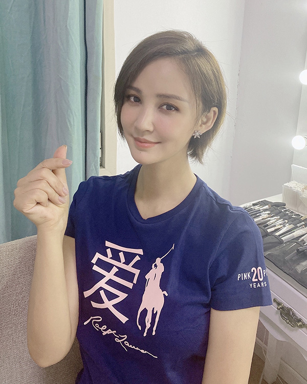 Zhang Xinyi in Pink Pony T Shirt.jpg