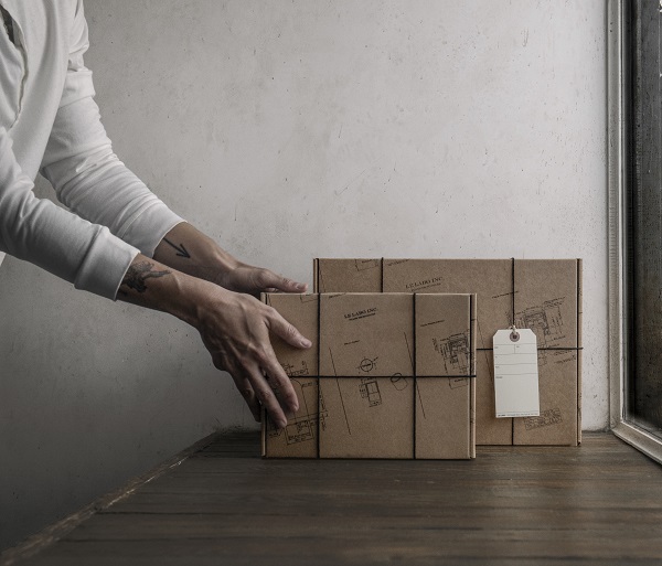 02. Le Labo 2024 Holiday Small and Large Technical Boxes with Gift Tag Lifestyle.jpeg